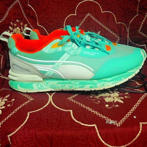 mint green puma sneakers